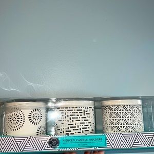 Set of three: pierced candle holders